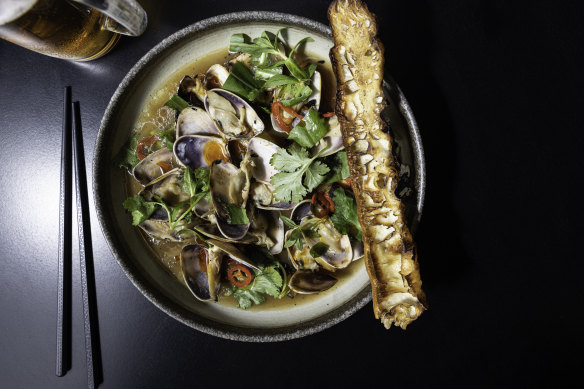 Pipis in canh chua (a sour Vietnamese soup) with wood-fired Chinese doughnut.