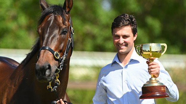 All smiles: Sam Freedman poses with Melbourne Cup winner Without A Fight on the Mornington Peninsula.