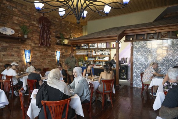 An octopus-style light is a feature of the dining room.