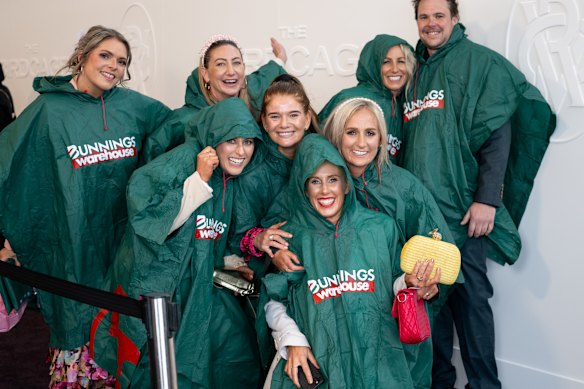 A group of friends from Ballarat arrive at The Birdcage. Soggy, but happy.