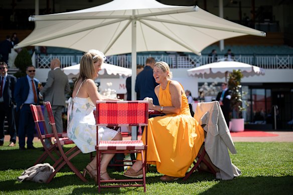 Friends Kate Kinsella and Tara Shimmim from Mordialloc  before the first race at the 2025 Caulfield Cup, Melbourne.