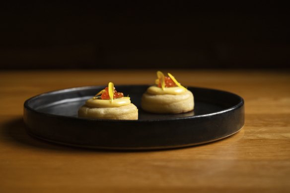 Crumpet with egg yolk, jalapeno and trout roe.