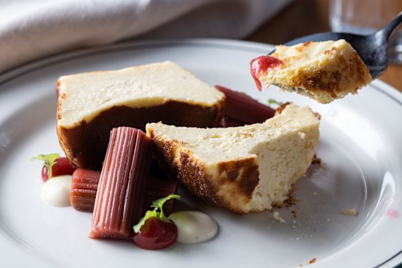 Poached rhubarb with baked cardamom cheesecake.