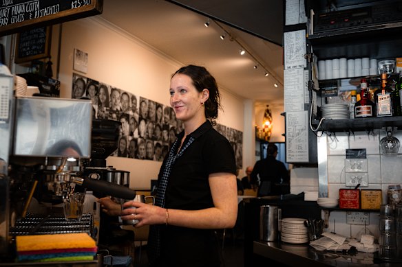 Barista Rosie Andrianakis behind the coffee machine, which runs morning till night.
