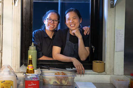 Partners in business and life, J. Y. Lee (left) and Thi Le.