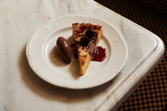 Pear frangipane tart with amarene and bitter chocolate sorbet.