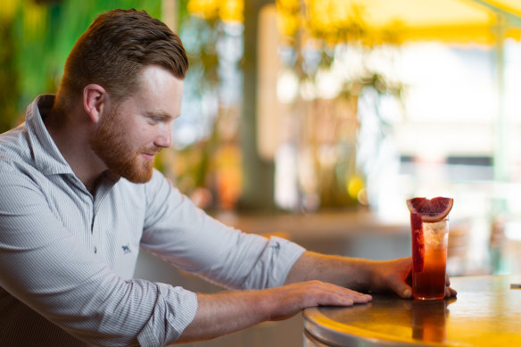 Bartender Tom Younger at HER Rooftop with their Bloody Perfect Paloma. 