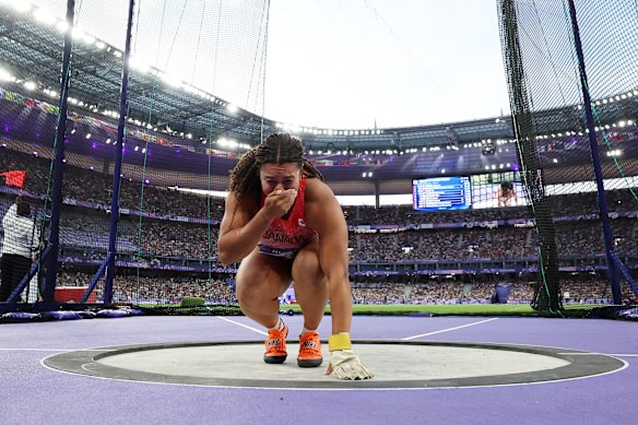 Camryn Rogers of Team Canada celebrates winning the gold medal after competing in the Women’s Hammer Throw Final.