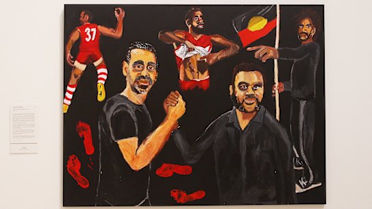 Artist Vincent Namatjira's 2020 Archibald Prize-winning portrait of himself and Adam Goodes.
