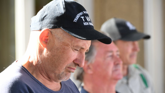 Outsourced Qantas workers stand outside the Federal Court which on Friday decided they would not be reinstated.