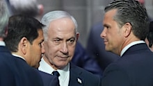 Israeli Prime Minister Benjamin Netanyahu, centre, speaks to US Secretary of Defence Pete Hegseth, right, and US Secretary of State Marco Rubio, left, in late July.