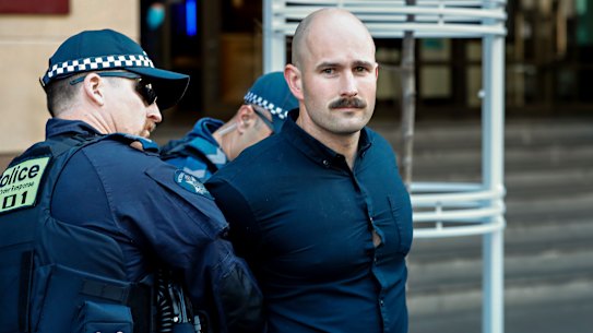 Thomas Sewell is arrested outside a Melbourne court on Tuesday.
