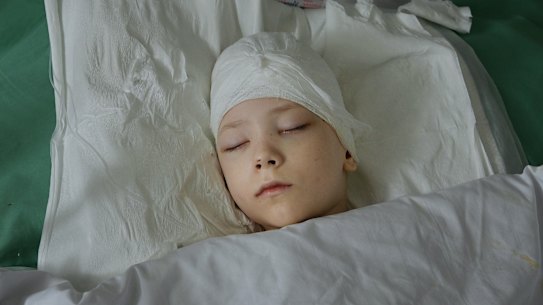 Volodymyr Baklanov was badly hurt in the same hail of gunfire that killed his mother.  