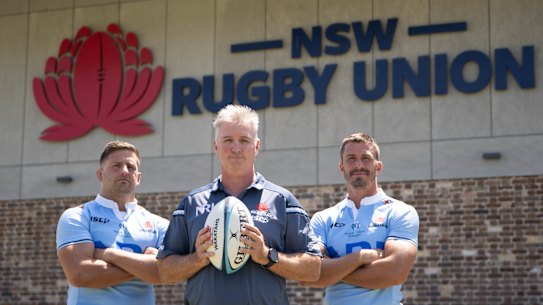 Waratahs head coach Darren Coleman (centre) with leaders Dave Porecki (left) and Jake Gordon (right).