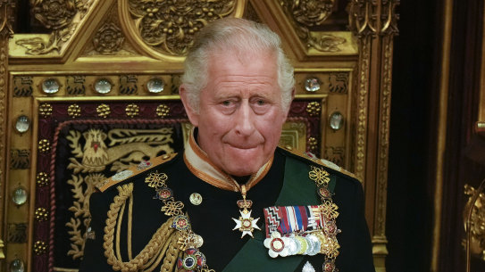 Prince Charles is seated next to the Queen’s crown during the State Opening of Parliament.