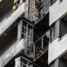 Concrete manufacturers seek tougher rules after cladding fire