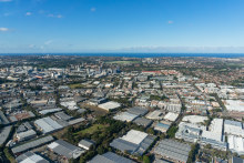 Sydney cityscape aerial view. Sydney suburbs with warehouses, commercial and residential property.