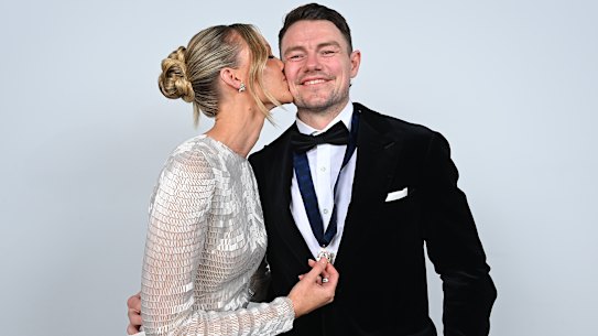 Lachie Neale with his wife, Julie.