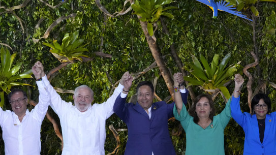 Leaders of South American nations pose for a group photo during the Amazon Summit in Belem, Brazil.  From left: the presidents of Colombia, Gustavo Petro,  Brazil, Luiz Inacio Lula Da Silva, Bolivia, Luis Arce, Peru, Dina Boluarte, and Venezuela’s Vice President Delcy Rodriguez. 