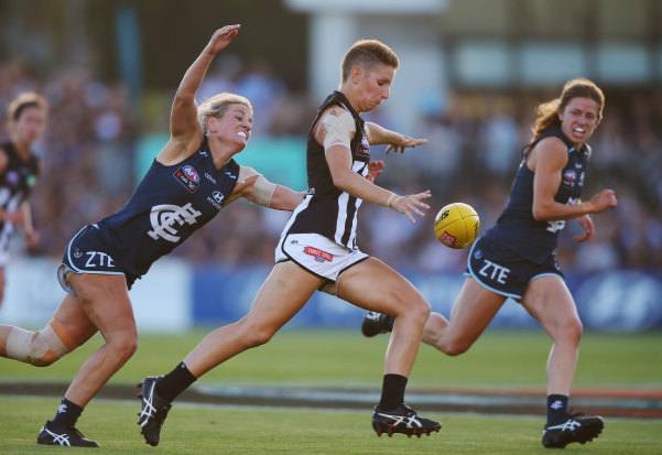 Emma Grant in action for Collingwood in the first AFLW game.