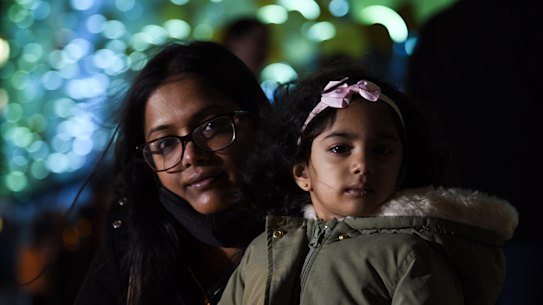 Vani Santhirasegaram and her daughter Akshaya during the vigil in support of the Murugappan family at Perth Childrens Hospital. 