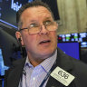 ASX falls as Wall Street slips after hitting milestone