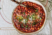 Serve puttanesca chickpeas over pasta to stretch this dish further.