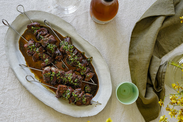 The black vinegar sauce on these Sichuan-style cumin and lamb skewers also serves as a glaze.