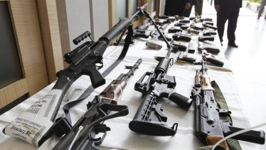 Various guns are displayed at the Chicago FBI office.