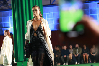 The Strateas Carlucci show at the Melbourne Fashion Festival is a collaboration with beer brand Victoria Bitter.  New MFF chief executive Caroline Ralphsmith will see the benefits of future team-ups between big business and fashion brands.