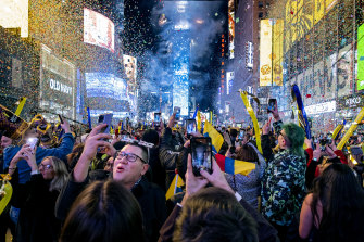 Revellers were allowed to return to Times Square this year to count in the New Year, a year after festivities were cancelled due to the pandemic. 