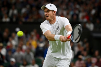 Andy Murray in action against John Isner.