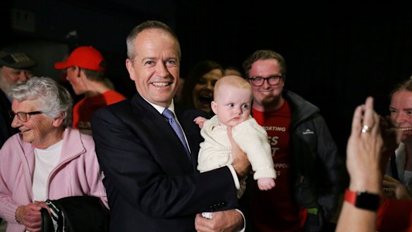 Labor leader Bill Shorten campaigned in a hipster beer bar with Labor supporters - and baby Phoebe - in Launceston on Monday.