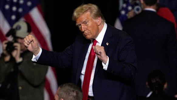 Donald Trump dances at his rally in Milwaukee.