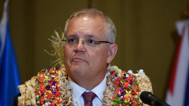 Prime Minister Scott Morrison, pictured in Fiji last year. Australia has kept all essential personnel in the South Pacific and its posts remain open.