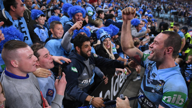 Priceless: Blues captain Boyd Cordner celebrates victory in last year's Origin series.