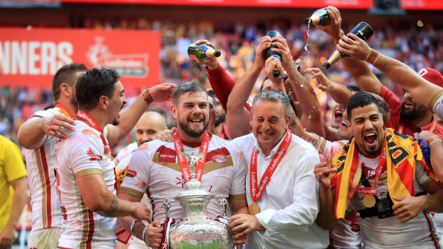 Cup kings: Steve McNamara (centre) guided Catalans to Challenge Cup glory last year at Wembley.