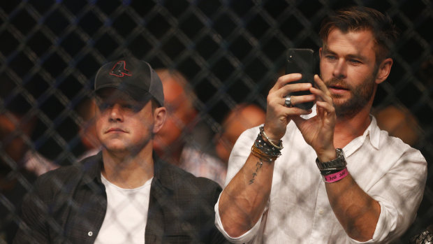 Star power: Hollywood heavyweights Matt Damon and Chris Hemsworth watch the fight.