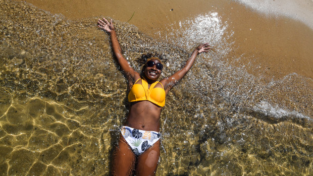 This is how you cool off! Bathers hit St Kilda beach earlier today.