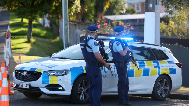New Zealand Police guard Reynella Drive, Massey, Auckland, after the shooting.