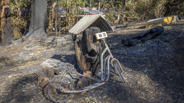 Damaged properties are seen at Binna Burra Road, Beechmont.