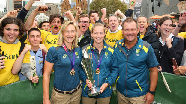 Perry with Meg Lanning and Mott with the T20 World Cup trophy the hope to retain.