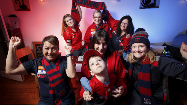 Shirley Pettman, left,  with other Melbourne fans who are planning their best route to Perth. 
