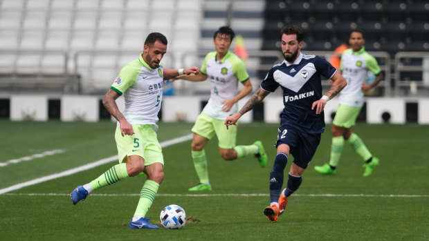 Renato Augusto of Beijing Guoan passes the ball during the AFC Champions League Group E match against Melbourne Victory.