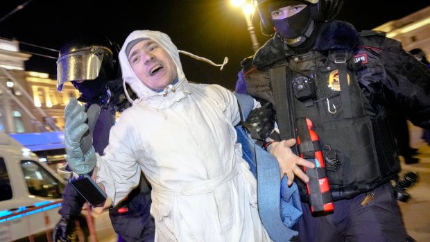 Police detain an anti-war demonstrator in St Petersburg, Russia, on Friday. Protests continued at the weekend across Russia, resulting in thousands of arrests as the government cracks down on dissent.