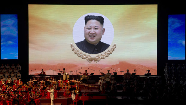 A portrait of North Korean leader Kim Jong-un is displayed on a large screen during a evening gala performance on the eve of the 70th anniversary of North Korea's founding day on Saturday.