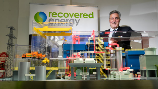 Recovered Energy Australia director Ian Guss with a model of the proposed waste to energy plant in Laverton North.