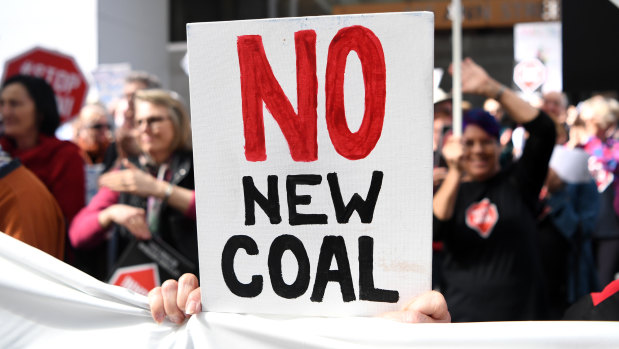 Adani-Adani protesters outside engineering construction company GHD in Brisbane on August 1. The Carmichael coal mine has become a lightning rod for the anti-coal movement.