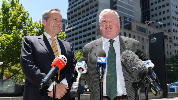 Gordon Legal’s Peter Gordon (right) led the class action against the government on behalf of welfare recipients who were unlawfully forced to repay money. Labor’s Bill Shorten led his party’s charge against it.