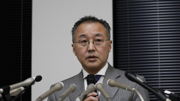 Noriyuki Yamaguchi speaks at a news conference on Wednesday.